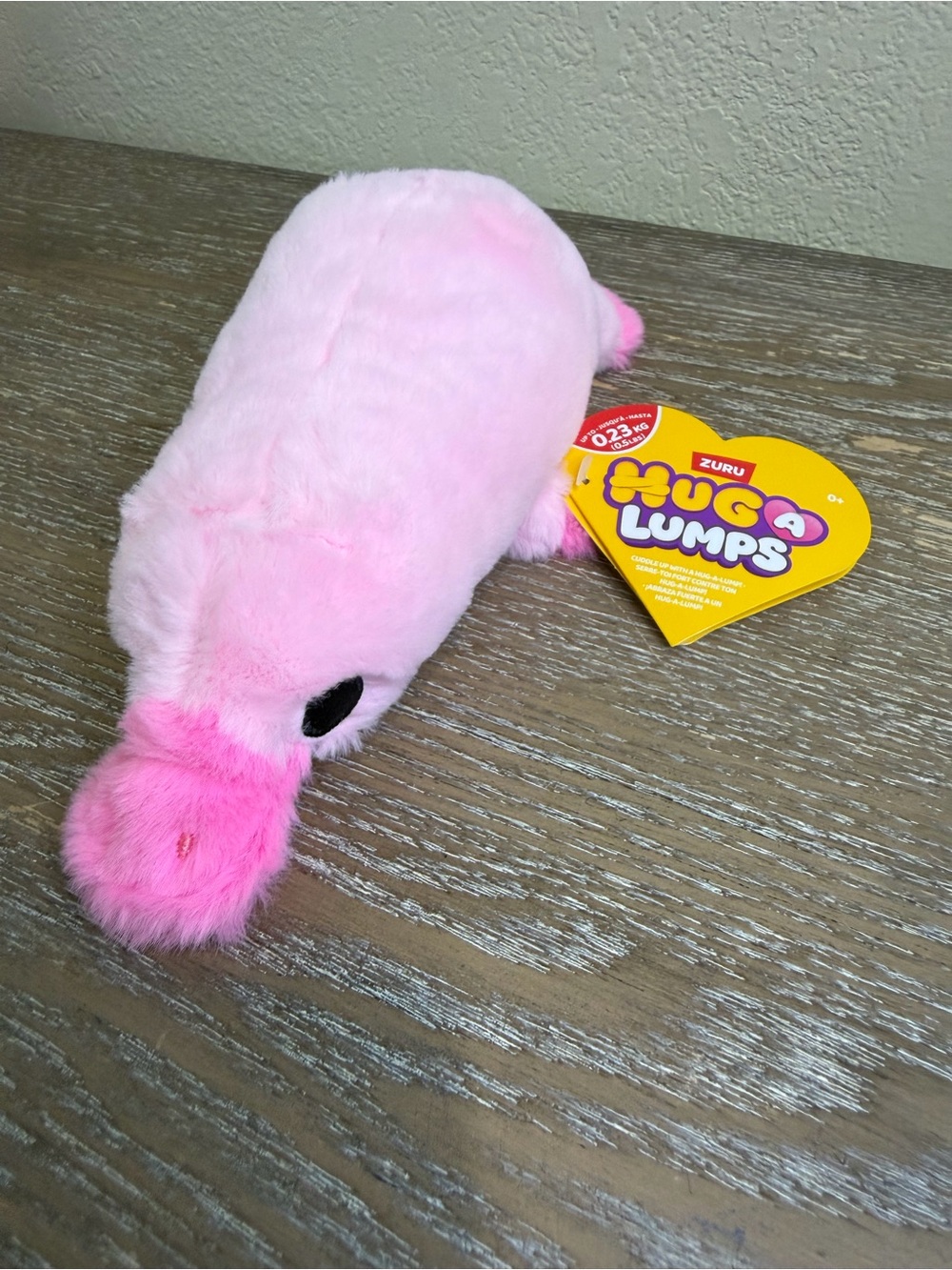 Zuru Hug-A-Lumps Perry - FUZZY mini weighted pink platypus